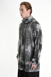 Patterned gray sweater.