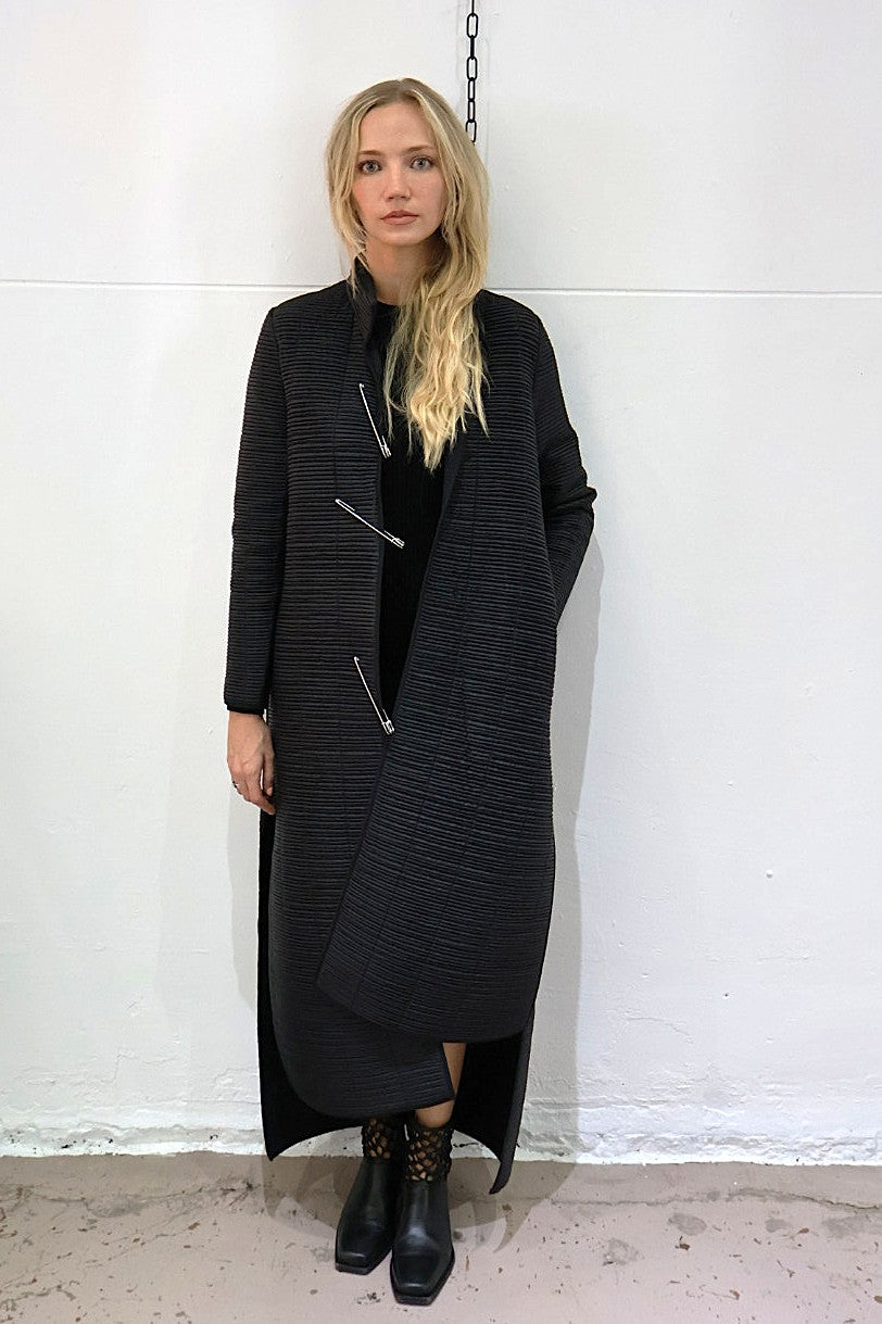 Maria Calderara Strada long slim coat, quilted nylon tubes, extra large safety pins - Sculptural Matte Finish