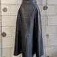 Mignon Doo Faux Leather black Midi Skirt with a back zipper. NYC - LiLi The First boutique