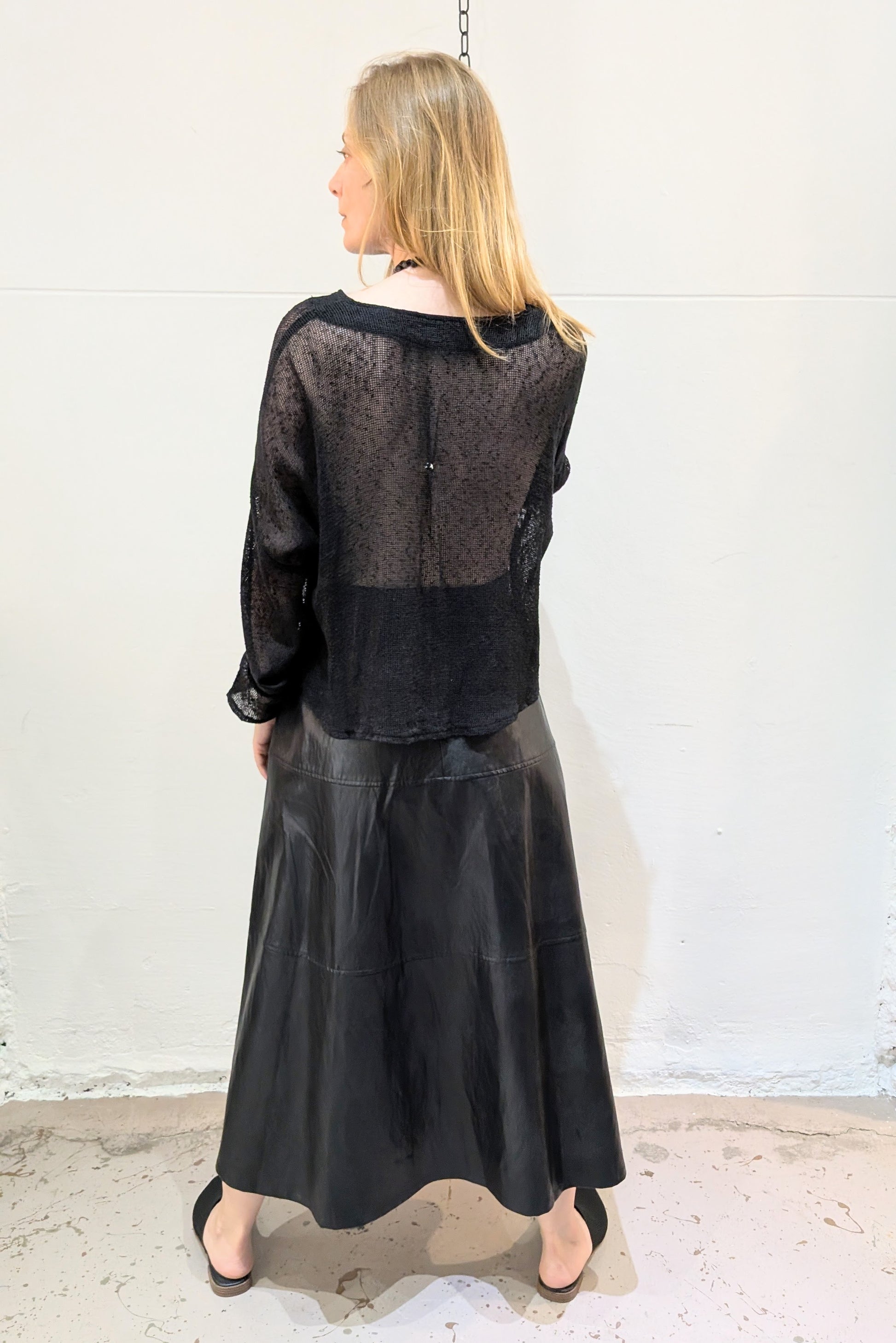 Mignon Doo Faux Leather black Midi Skirt with a back zipper. NYC - LiLi The First boutique