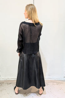 Mignon Doo Faux Leather black Midi Skirt with a back zipper. NYC - LiLi The First boutique