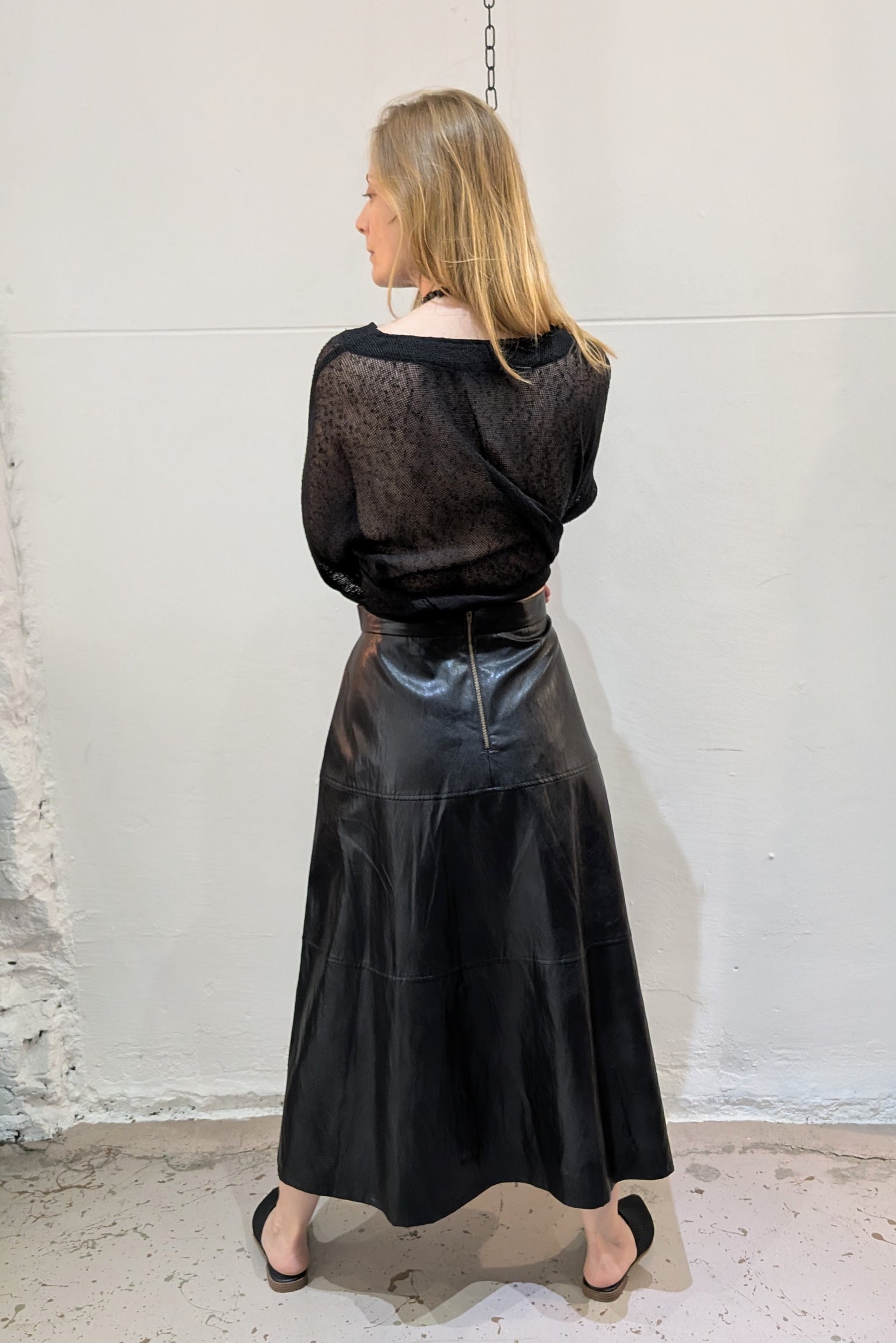 Mignon Doo Faux Leather black Midi Skirt with a back zipper. NYC - LiLi The First boutique
