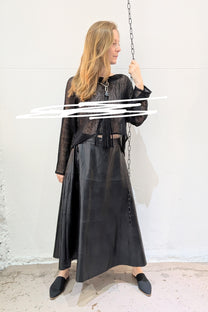 Mignon Doo Faux Leather black Midi Skirt with a back zipper. NYC - LiLi The First boutique