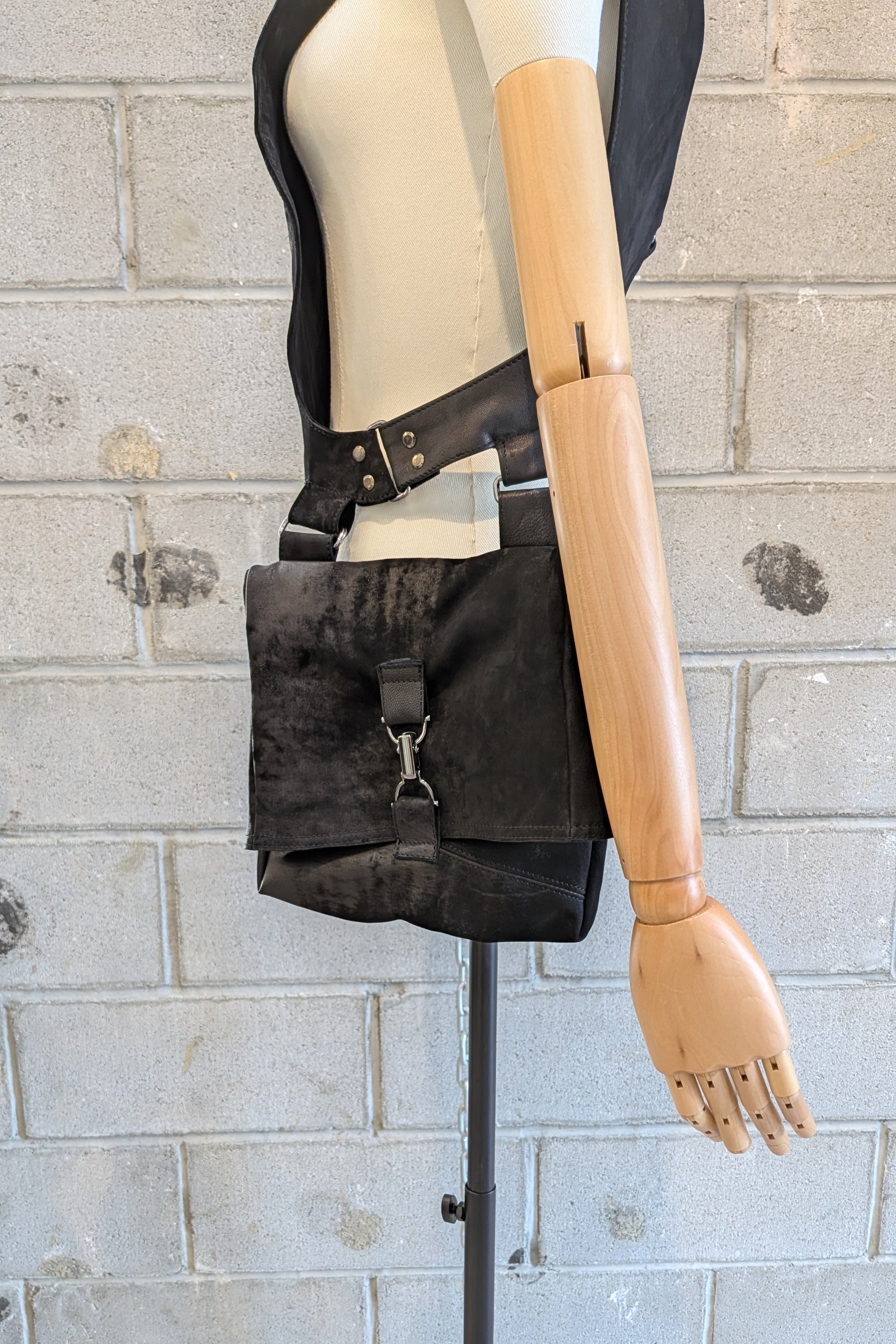 Sandrine Philippe leather harness top with a bag