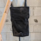 Sandrine Philippe leather harness top with a bag