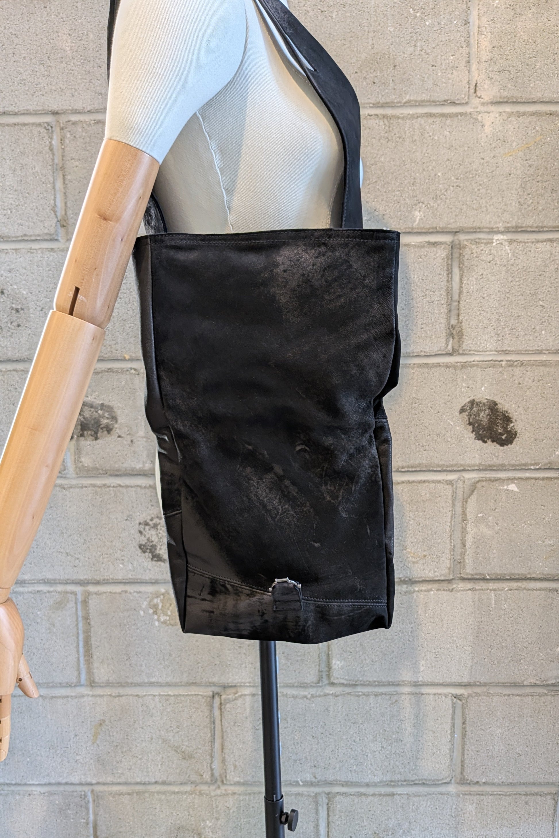 Sandrine Philippe leather harness top with a bag