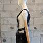 Sandrine Philippe leather harness top with a bag