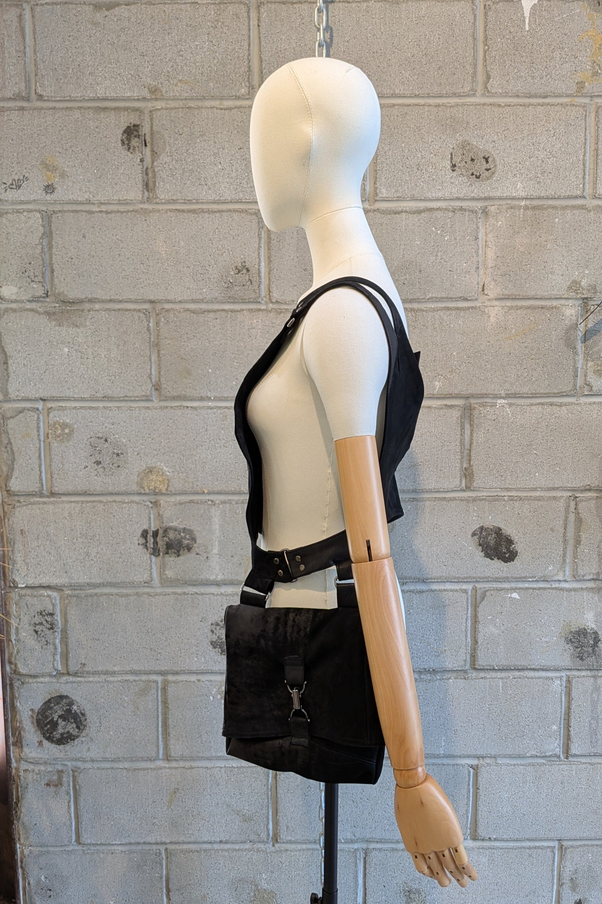 Sandrine Philippe leather harness top with a bag