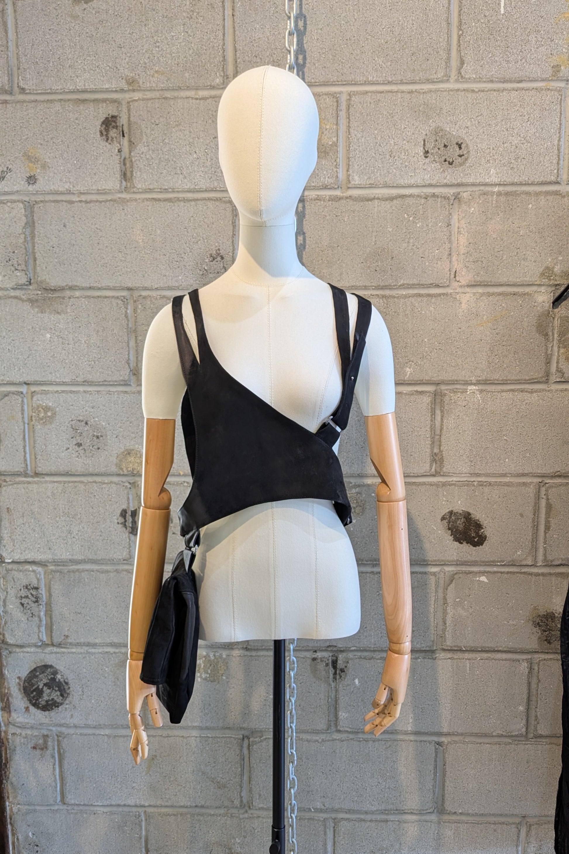 Sandrine Philippe leather harness top with a bag