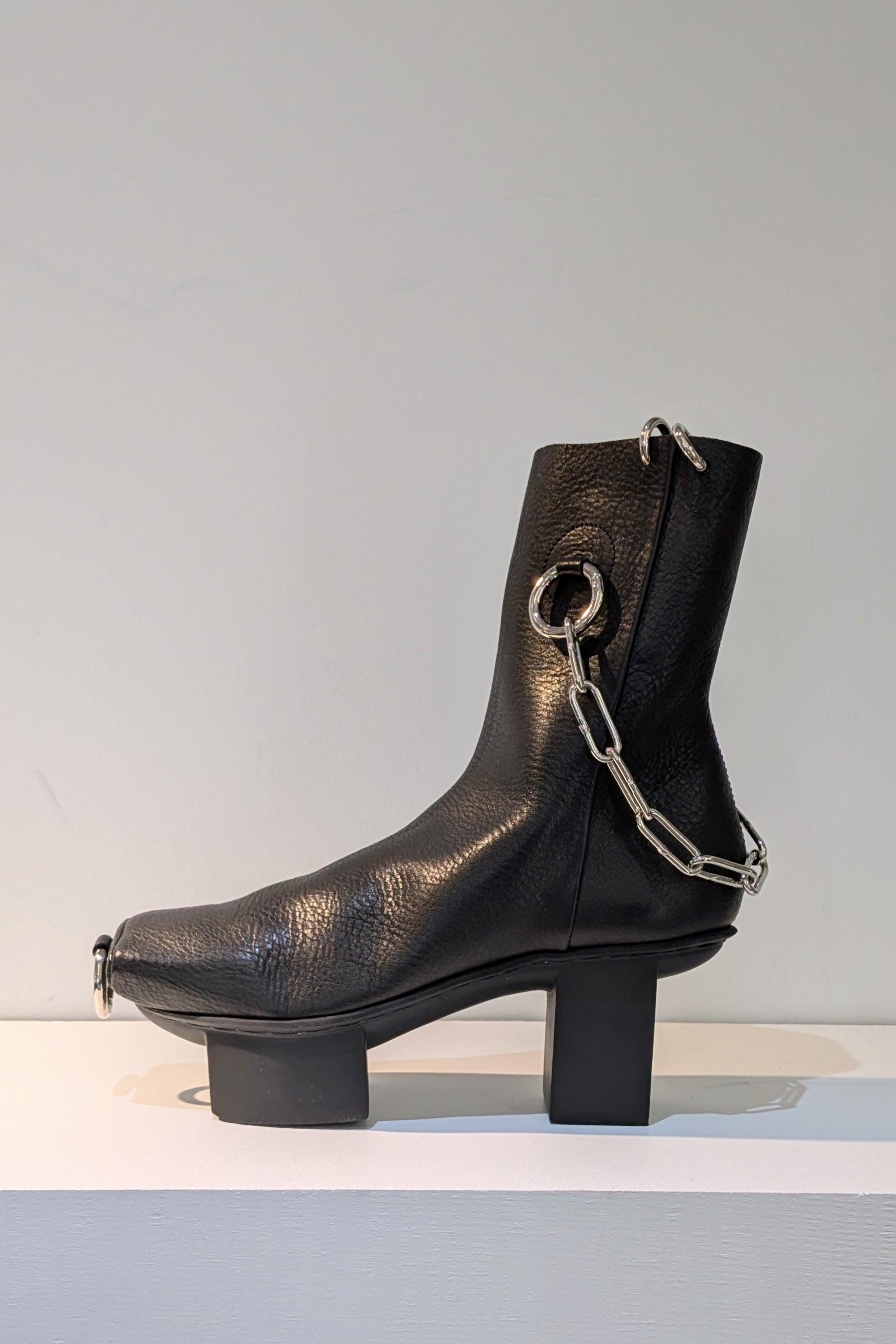 Fecal Matter x Trippen Collaboration Hard Core black leather platform booties with chains, Avant-Garde style