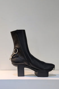 Fecal Matter x Trippen Collaboration Hard Core black leather platform booties with chains, Avant-Garde style