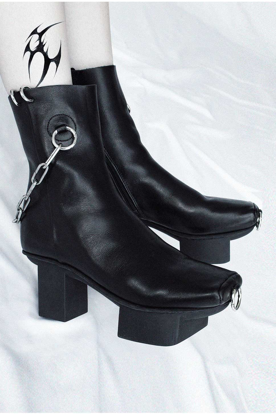 Fecal Matter x Trippen Collaboration Hard Core black leather platform booties with chains, Avant-Garde style