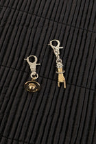 Vivienne Westwood. Anatoly earrings, uneven pair, handcuffs