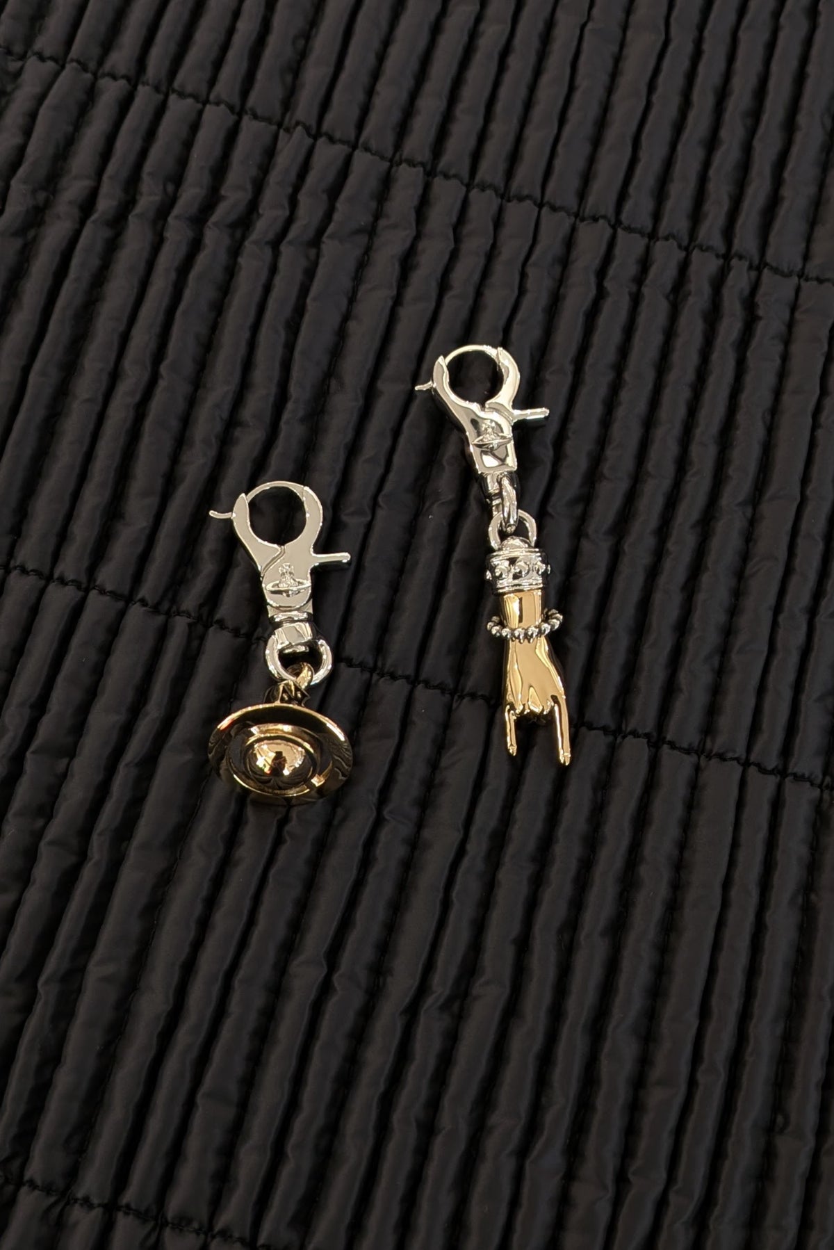 Vivienne Westwood. Anatoly earrings, uneven pair, handcuffs