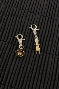 Vivienne Westwood. Anatoly earrings, uneven pair, handcuffs