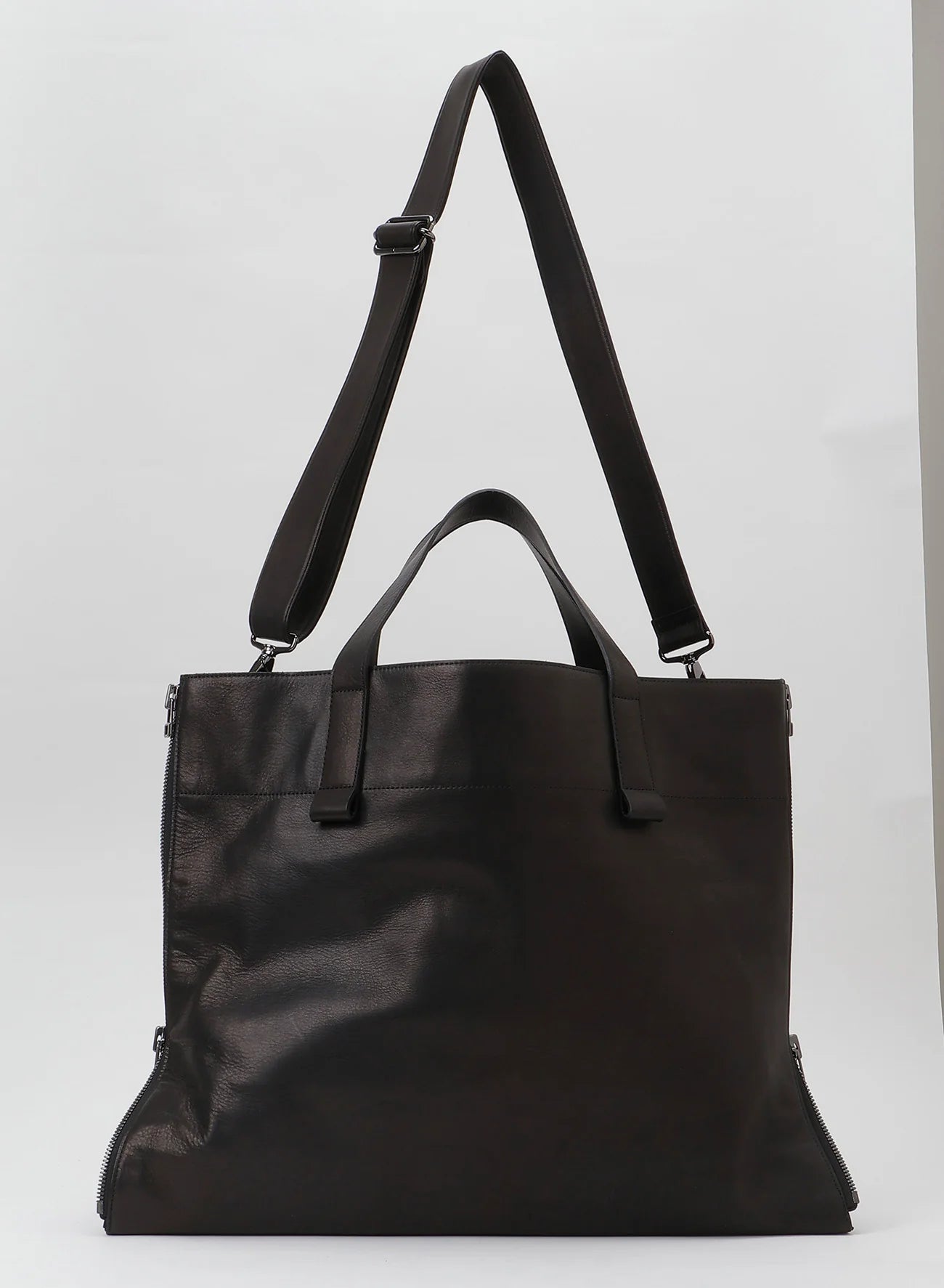 YOHJI YAMAMOTO side zip tote, laptop bag, cross body strap, black leather.