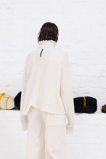 serienumerica white cashmere sweater , recycled cashmere turtleneck, uneven