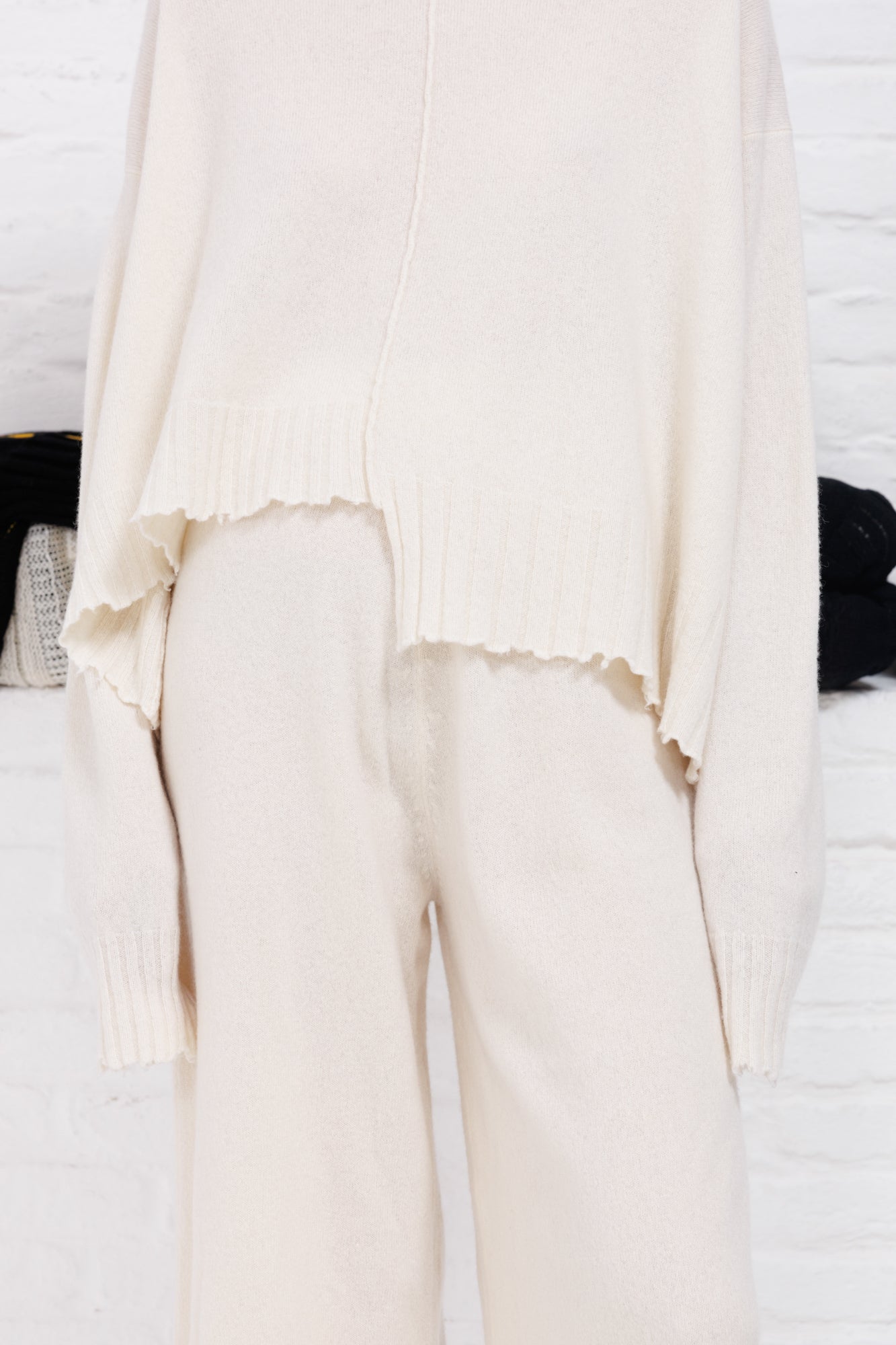 serienumerica white cashmere sweater , recycled cashmere turtleneck, uneven